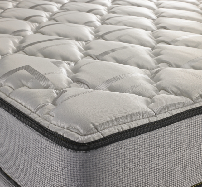 Corner of a white mattress