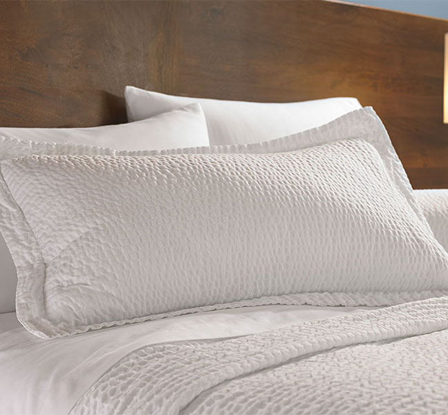 A rippled white pillow