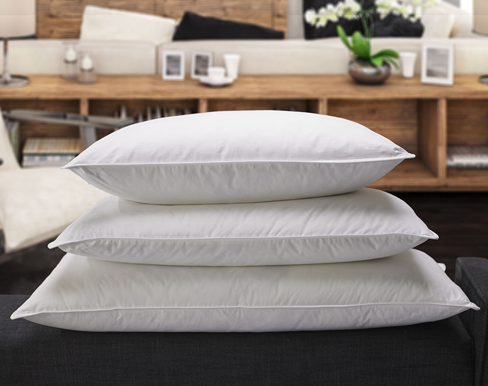 Three white pillows stacked