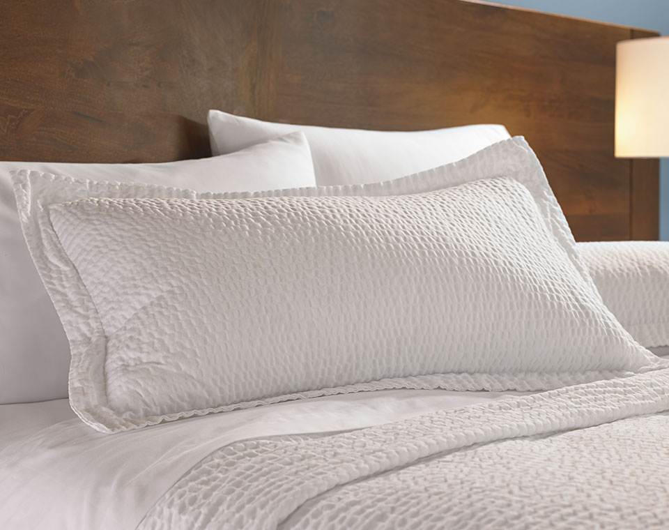 A rippled white pillow